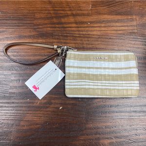 Coach tan white leather wristlet
